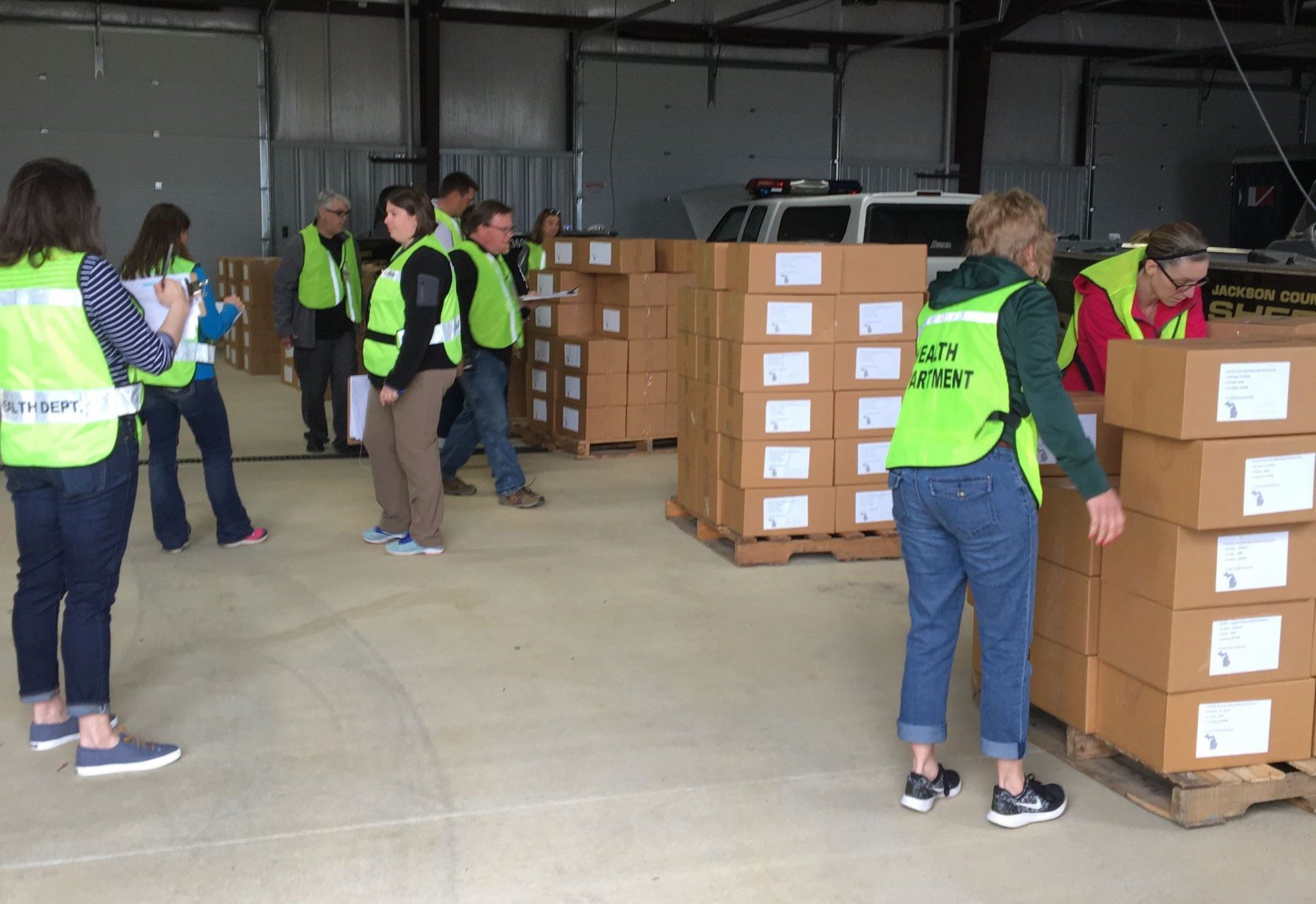 Photo of Emergency Preparedness Supply Exercise with people loading boxes